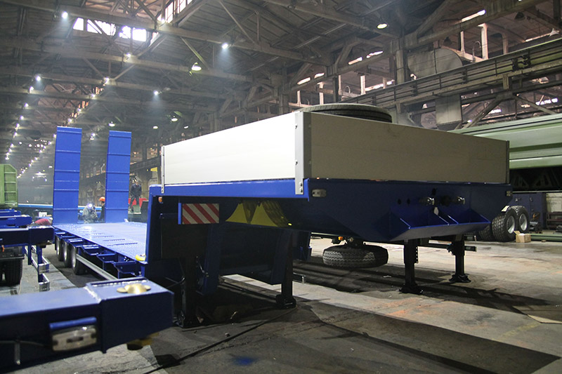 Низкорамный полуприцеп-тяжеловоз чмзап 99064 по спецификации 052 мт2