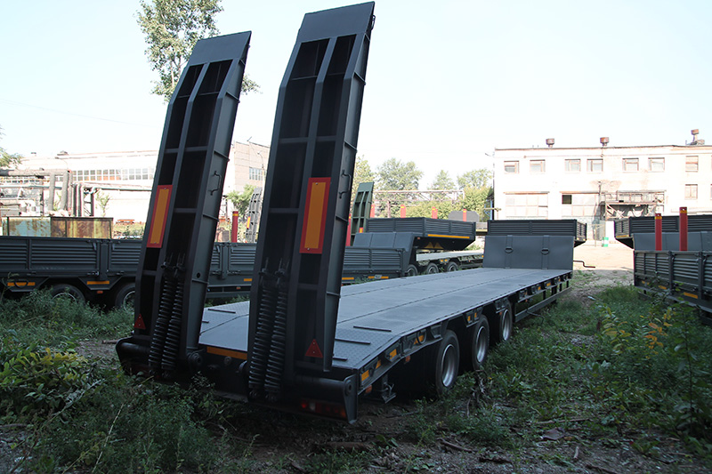 Низкорамный полуприцеп-тяжеловоз чмзап 99064 по спецификации 042-02