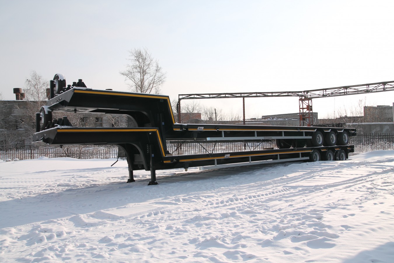 Низкорамный полуприцеп-тяжеловоз чмзап 99064 по спецификации 042 kз