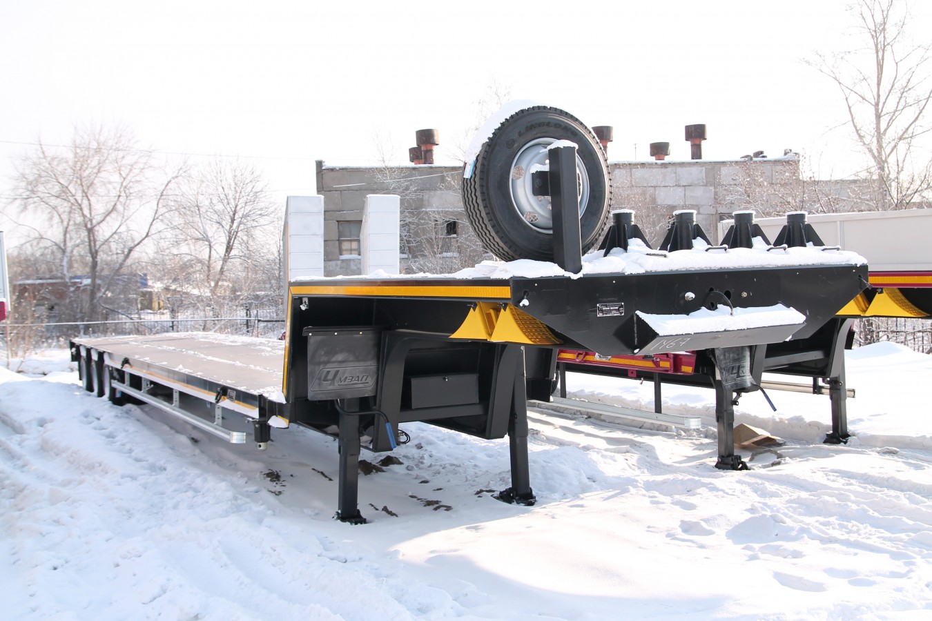 Низкорамный полуприцеп-тяжеловоз чмзап 99064 по спецификации 042 kз