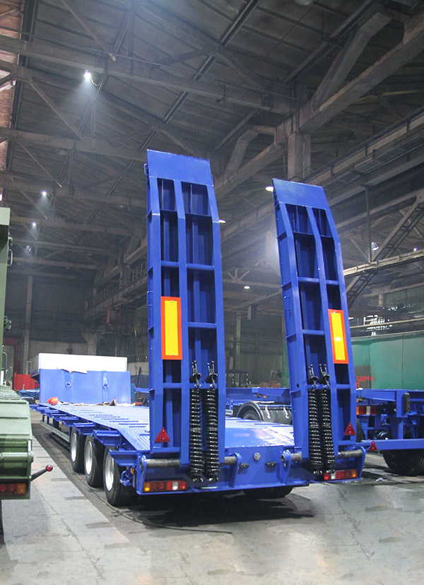 Низкорамный полуприцеп-тяжеловоз чмзап 99064 по спецификации 052 мт2